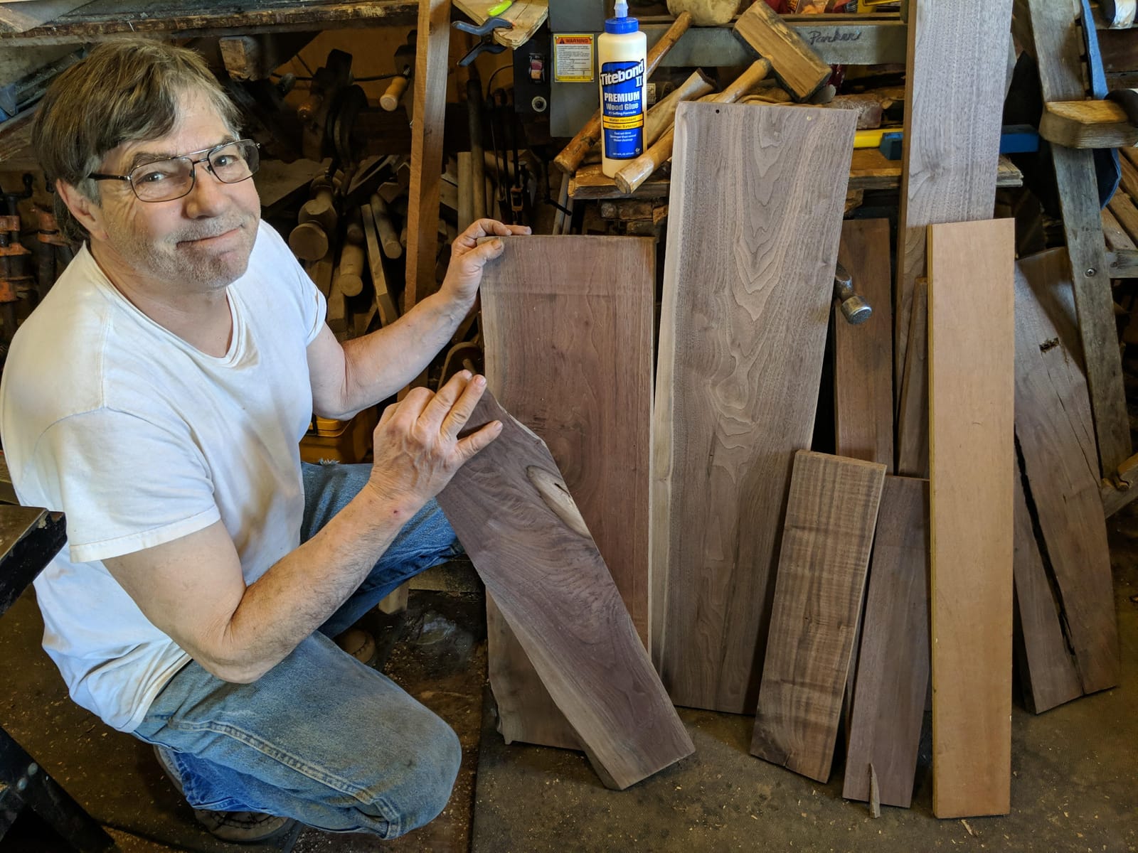 Selecting figured walnut boards in the shop